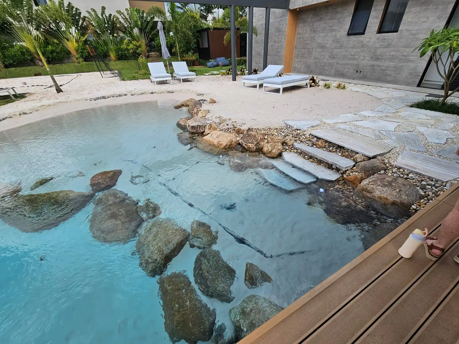 Natural stone steps Submerged stone steps in crystal clear water
